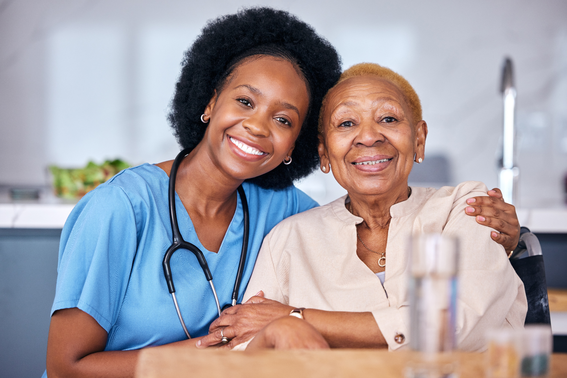 Senior care professional providing compassionate assistance to elderly resident in assisted living community